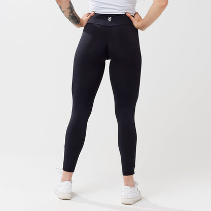 Model wearing black leggings for use in active lifestyles as well as casual living.