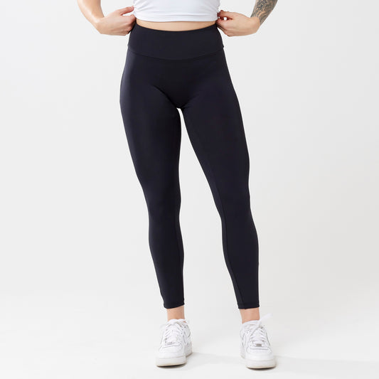 Model wearing black leggings for use in active lifestyles as well as casual living.
