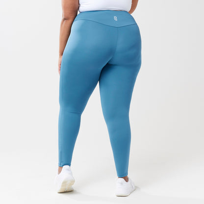 Plus sized model wearing sky blue leggings for use in active lifestyles as well as casual living.